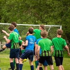 The Key Stage 4 Boys Football team playing football