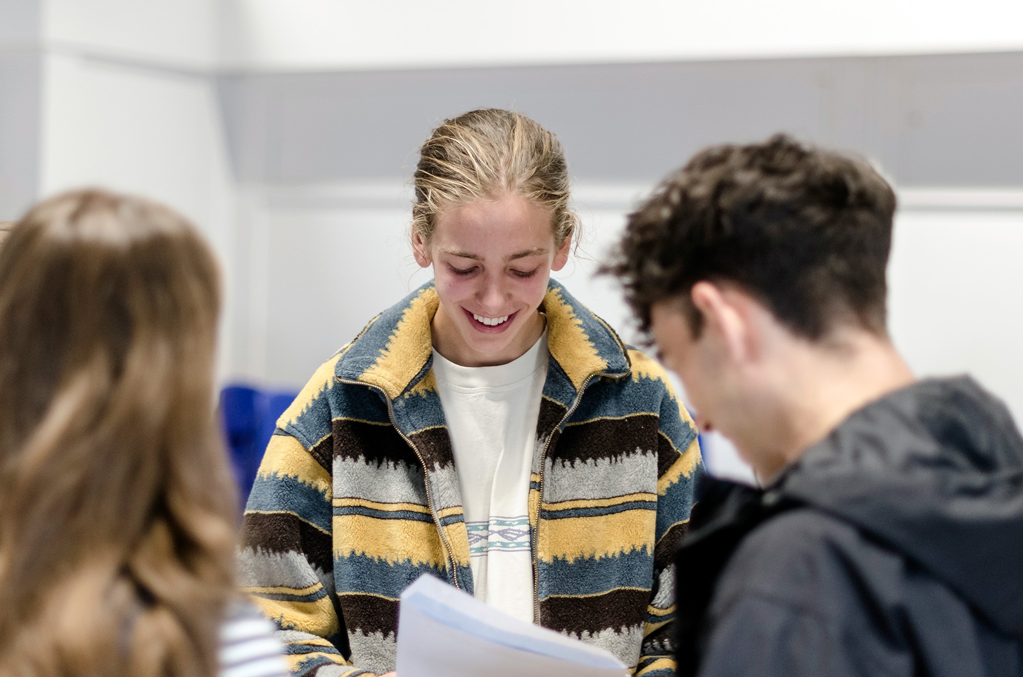 Hope Valley College student opening and celebrating their GCSE results